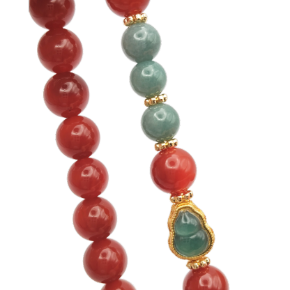 Nan Hong Agate With Guatemalan Jade Hulu Design